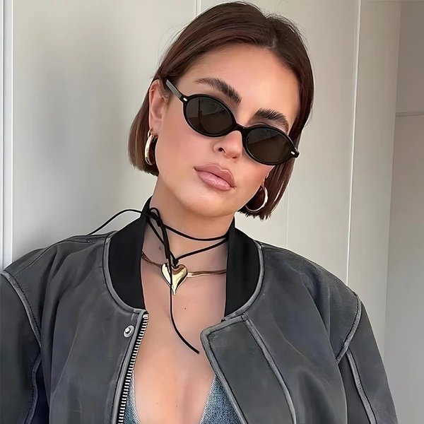 Damen stilvolle und zeitgenössische Sonnenbrille im ovalen Design