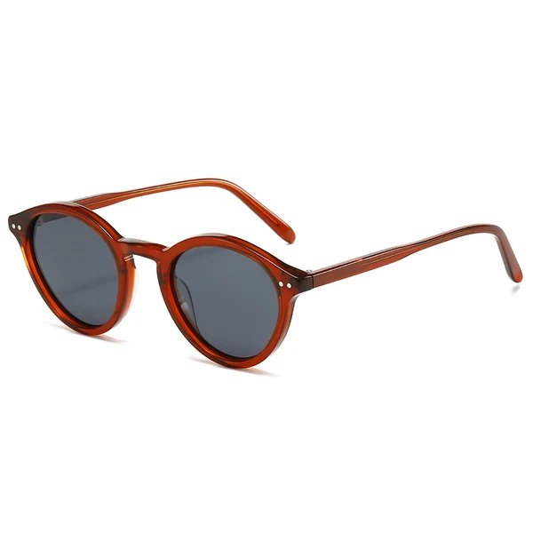 Damen modische Sonnenbrille mit trendigen runden Gläsern und stylischem Rahmen