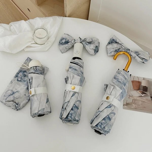 Damen Faltbarer Regenschirm mit romantischem Blumendesign