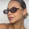 Damen retro-inspirierte Sonnenbrille mit zeitgemäßem Design und markantem Rahmen