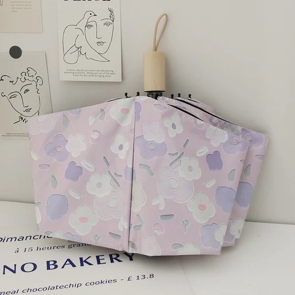 Damen Faltbarer Regenschirm mit stilvollem Blumendesign Hover Image