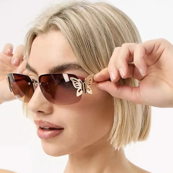 Damen modische Sonnenbrille mit filigranem Schmetterlingsdesign und schützenden Gläsern