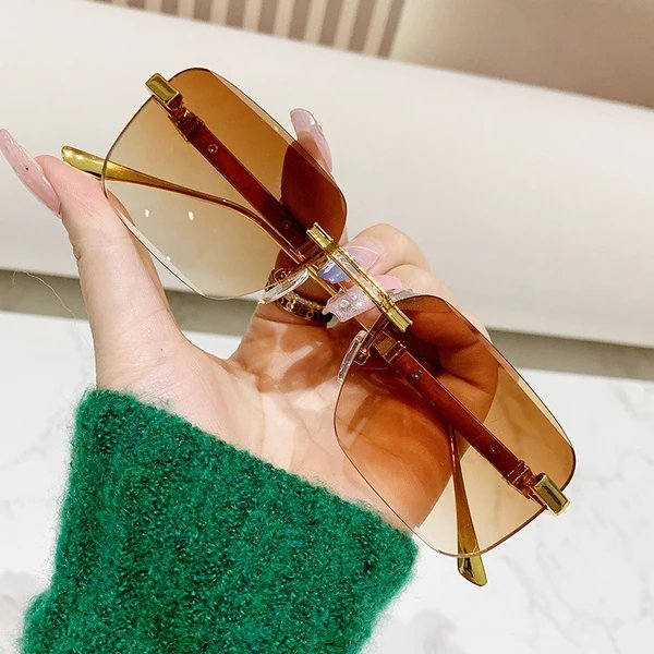 Damen modische rechteckige Sonnenbrille mit edlem Metallakzent