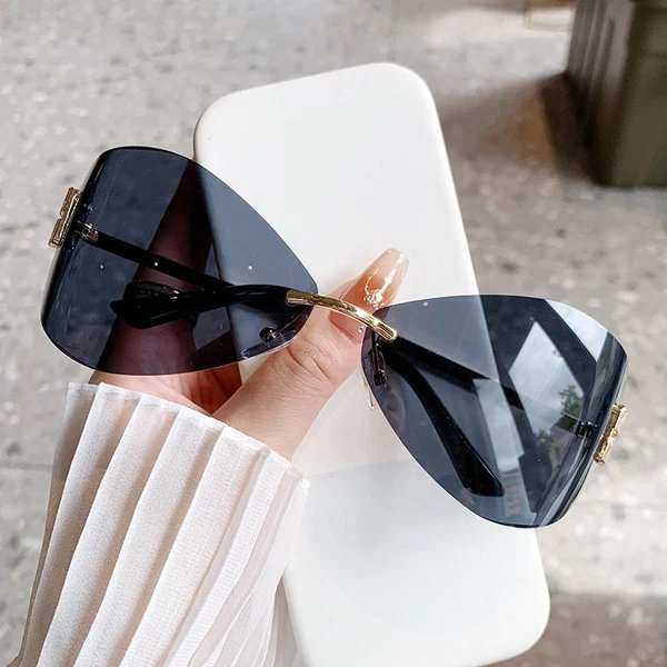 Damen Cat-Eye Sonnenbrille mit eleganter Verzierung und hochwertigem Rahmen