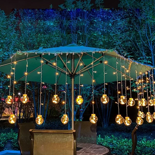 LED-Lichterkette – Wasserdichte Lichterkette für den Außenbereich mit warmweißem Licht Hover Image