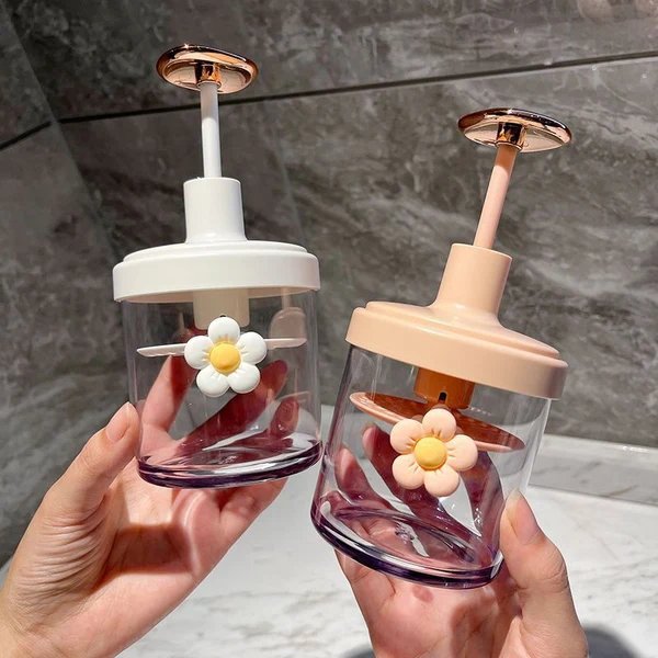 Dekorative Glas mit Blümchen-Design