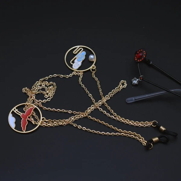 Artisanale symbolische Brillen-Kette Hover Image