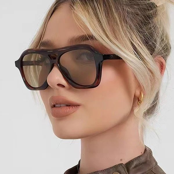 Damen modische Sonnenbrille im innovativen Design mit breitem Rahmen
