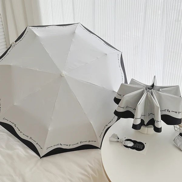 Damen Faltbarer Regenschirm mit stilvollem Design und praktischem Aufbewahrungssystem