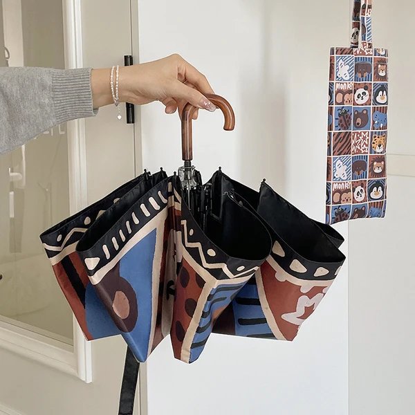 Damen Faltregenschirm mit kreativem geometrischem Design Hover Image