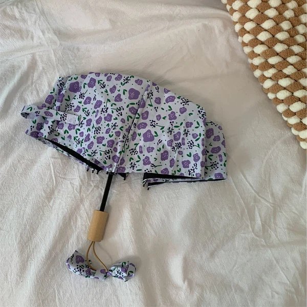 Damen Faltregenschirm mit floralem Design
