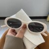 Damen moderne Katzenaugen-Sonnenbrille mit UV-Schutz und elegantem Rahmen