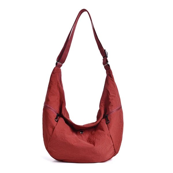 WoLightweight Multi-Pocket Sling Bag Hover Image