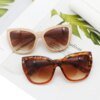 Damen Cat-Eye Sonnenbrille mit eleganten Akzenten