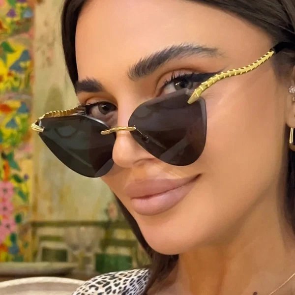 Damen Cat-Eye Sonnenbrille mit einzigartigem goldenen Rahmendesign und schützenden Gläsern