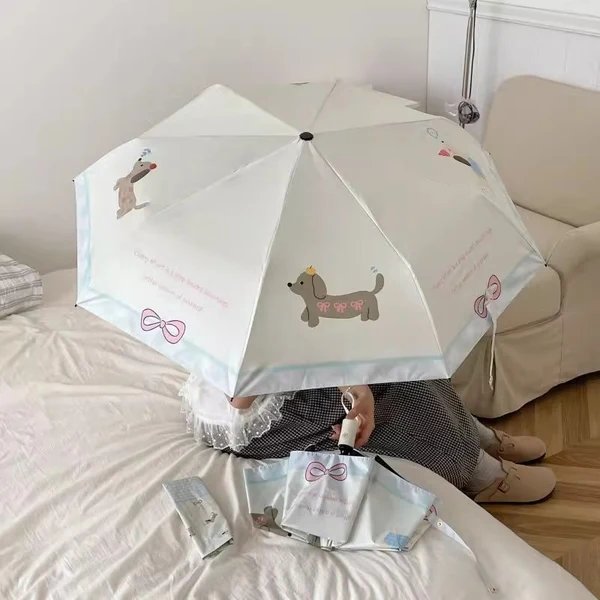 Damen kompakter Regenschirm im kreativen Design