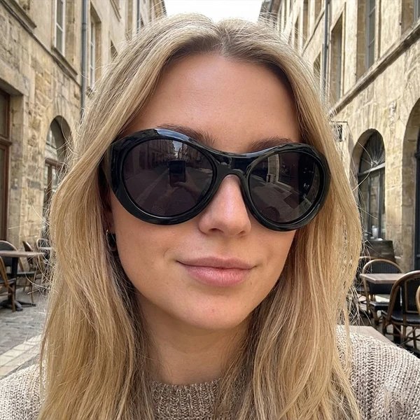 Damen Modische Ovale Sonnenbrille mit transparentem Rahmen