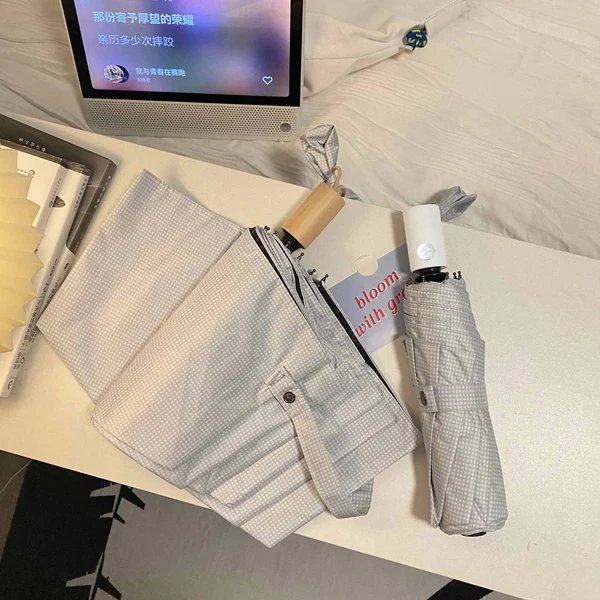 Damen eleganter Faltregenschirm mit klassischem Karomuster Hover Image