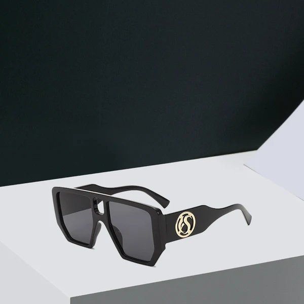 Damen Quadrat-Sonnenbrille mit auffälligem Muster und goldenen Akzenten