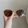 Damen runde Sonnenbrille mit elegantem Metallrahmen und UV-Schutz