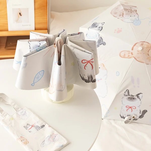 Damen Faltbarer Regenschirm mit liebevollen Tierillustrationen Hover Image