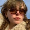Damen elegante Sonnenbrille mit transparentem Rahmen