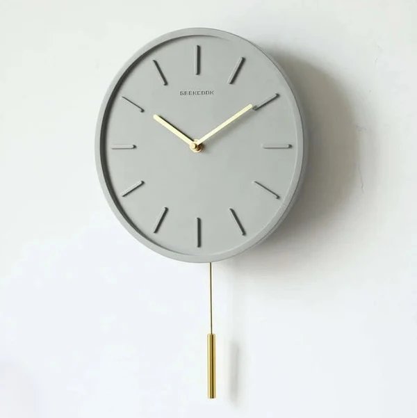 Nordic Zement Wanduhr mit Metallpendel | Minimalistische skandinavische Uhr für modernes Interieur Hover Image