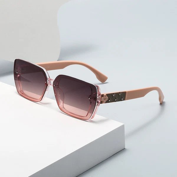 Damen Sonnenbrille mit extravaganten Schmuckdetails