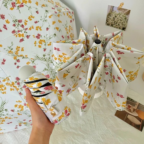 Damen Faltbarer Sonnenschutzschirm mit Blumendesign