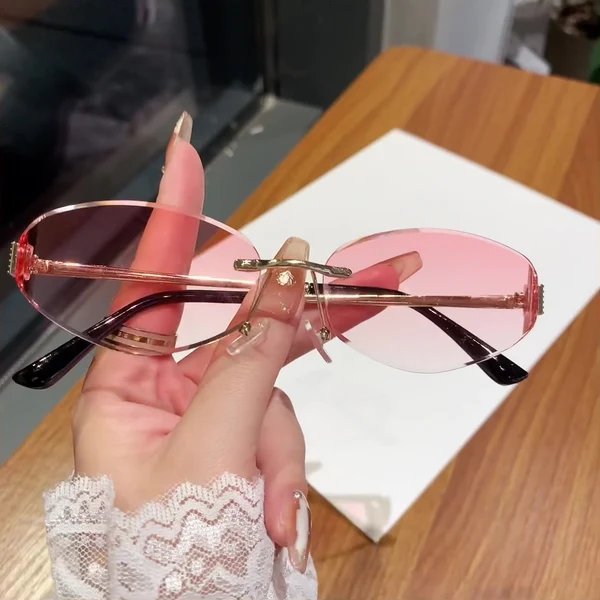 Damen Sonnenbrille im modernen Ovaldesign mit kontrastierendem Rahmen