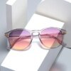 Damen elegante Sonnenbrille mit transparentem Rahmen und stylischen Akzenten