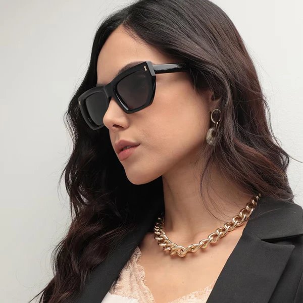 Damen Modische Sonnenbrille mit einzigartigem sechseckigem Rahmen und schützenden Gläsern